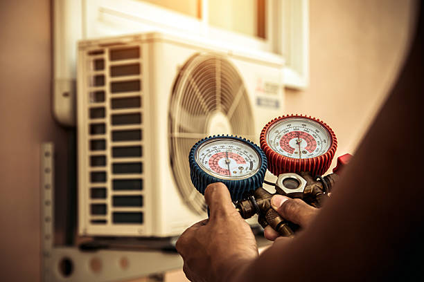 Professional Air Conditioning Service technician working in Mamaroneck, NY